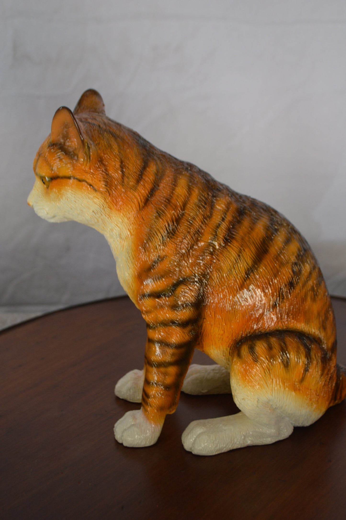 Colored Cat Sitting Bronze Statue -  Size: 6"L x 11"W x 11"H.