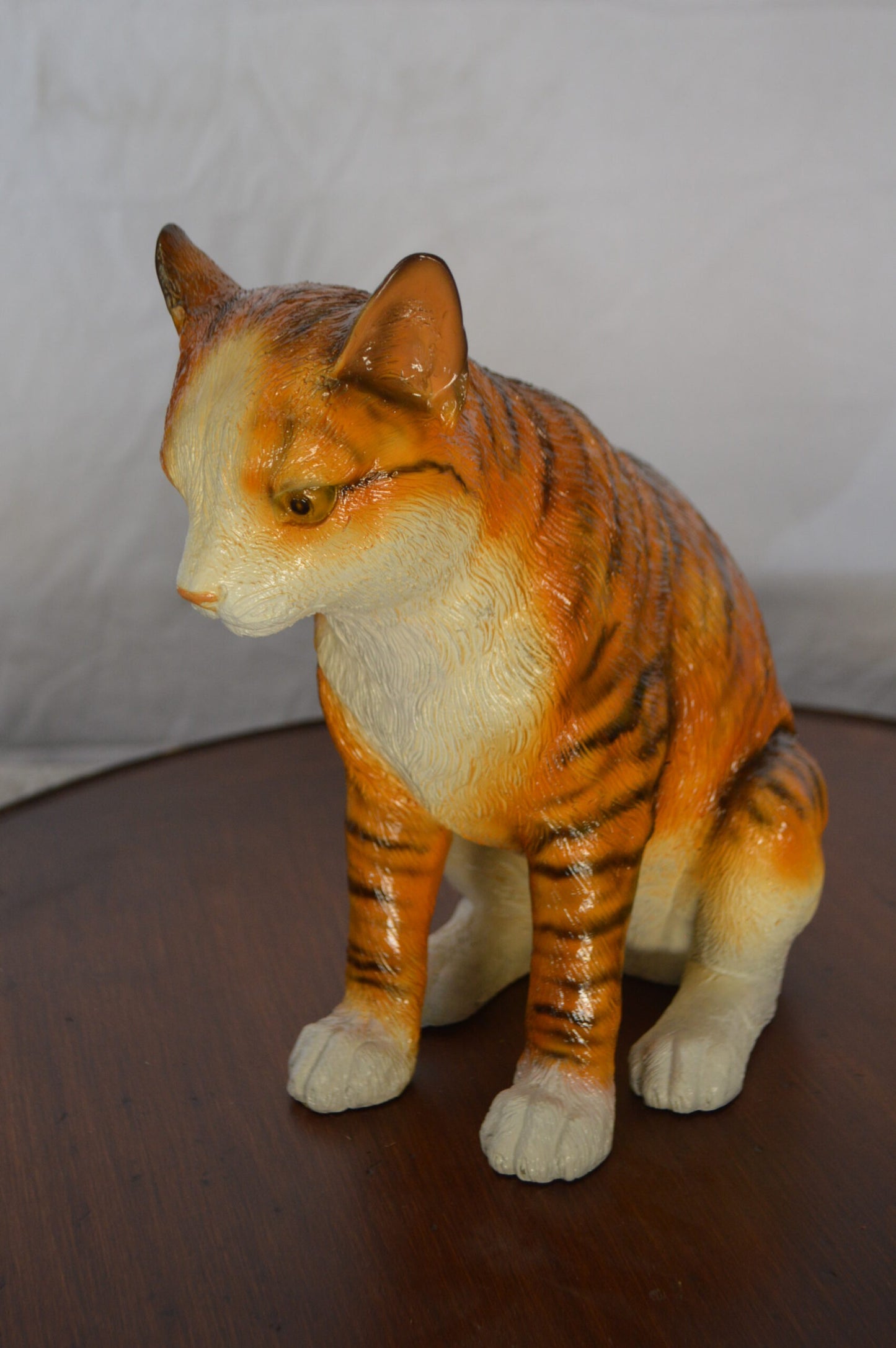 Colored Cat Sitting Bronze Statue -  Size: 6"L x 11"W x 11"H.