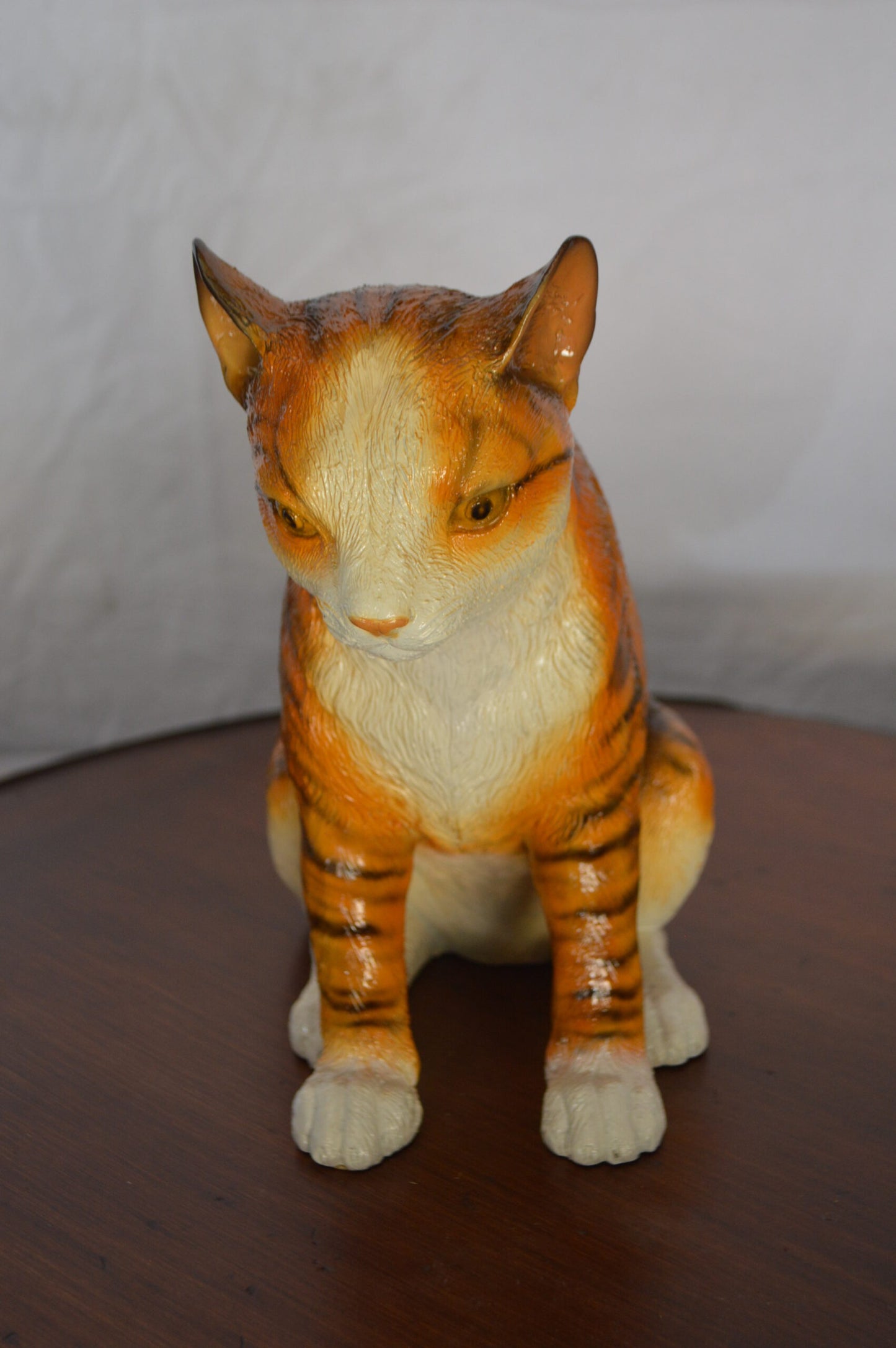 Colored Cat Sitting Bronze Statue -  Size: 6"L x 11"W x 11"H.