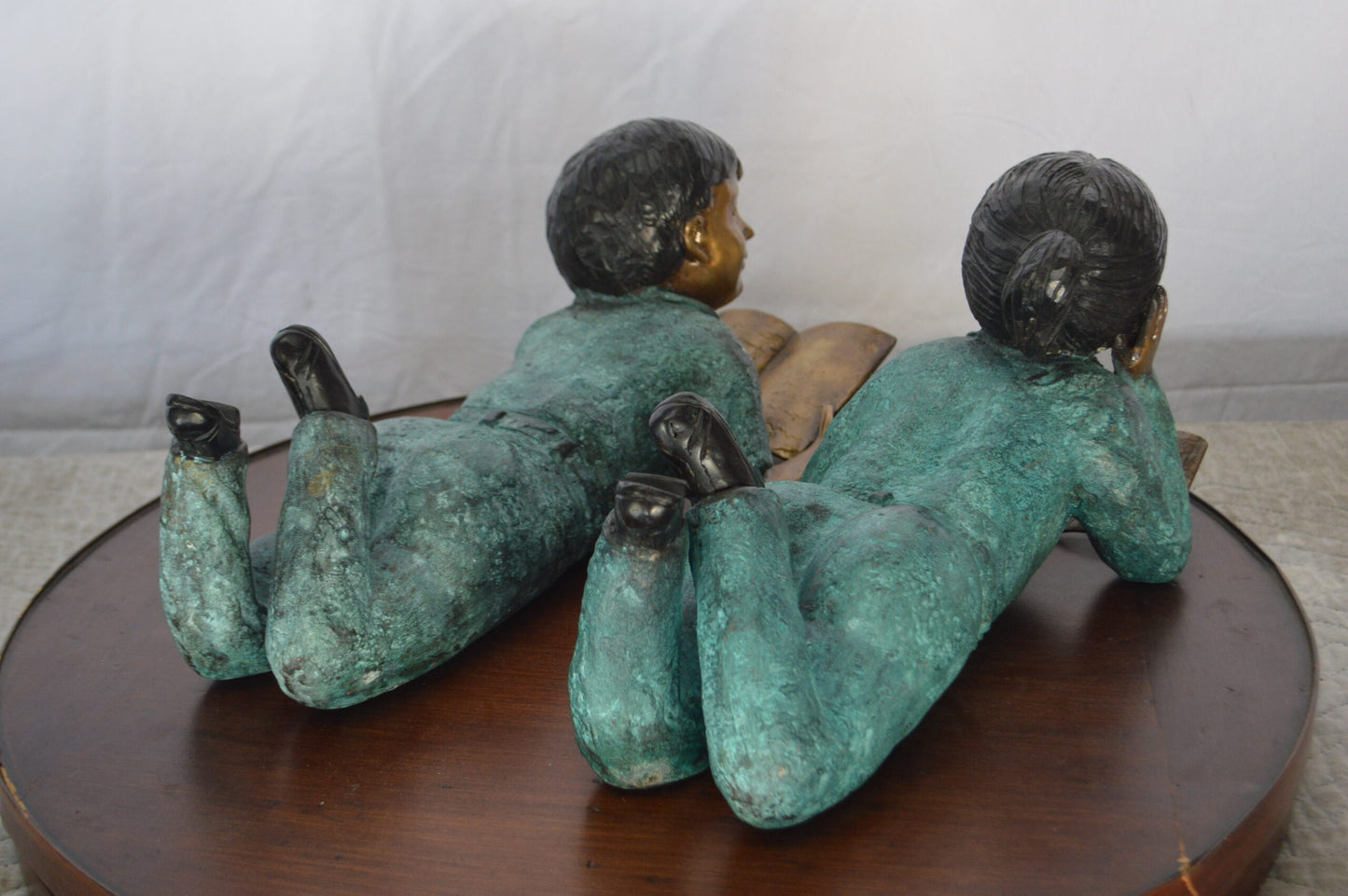 Set of a Boy and a Girl Reading a Book Bronze Statue -  Size: 16"L x 7"W x 8"H.