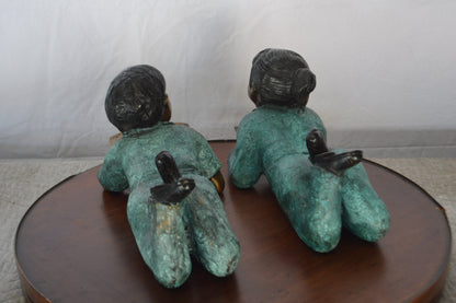Set of a Boy and a Girl Reading a Book Bronze Statue -  Size: 16"L x 7"W x 8"H.