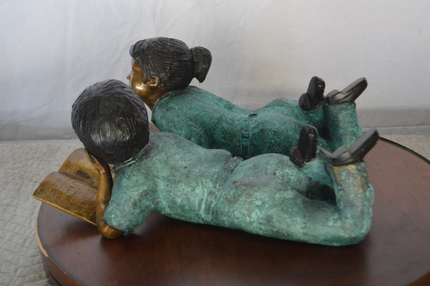Set of a Boy and a Girl Reading a Book Bronze Statue -  Size: 16"L x 7"W x 8"H.