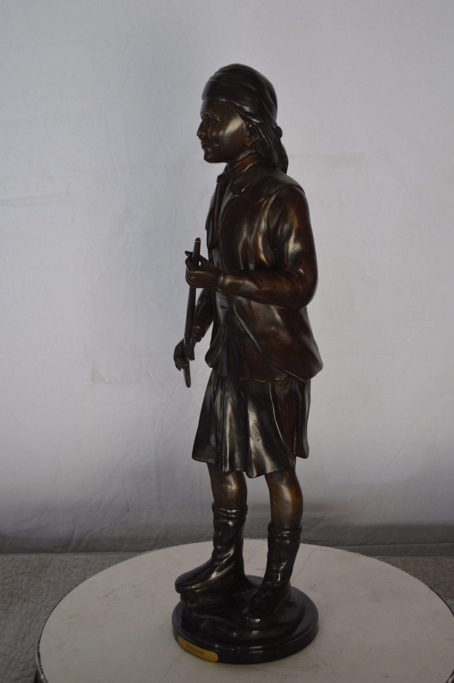 Geronimo Bronze Statue Mounted on a Marble Base -  Size: 10"L x 8"W x 31"H.