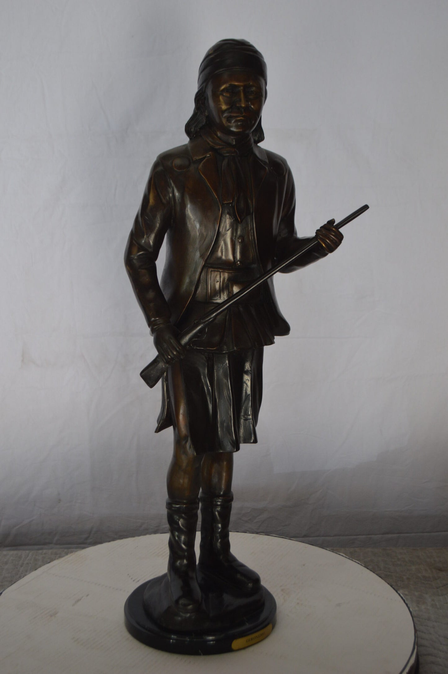 Geronimo Bronze Statue Mounted on a Marble Base -  Size: 10"L x 8"W x 31"H.