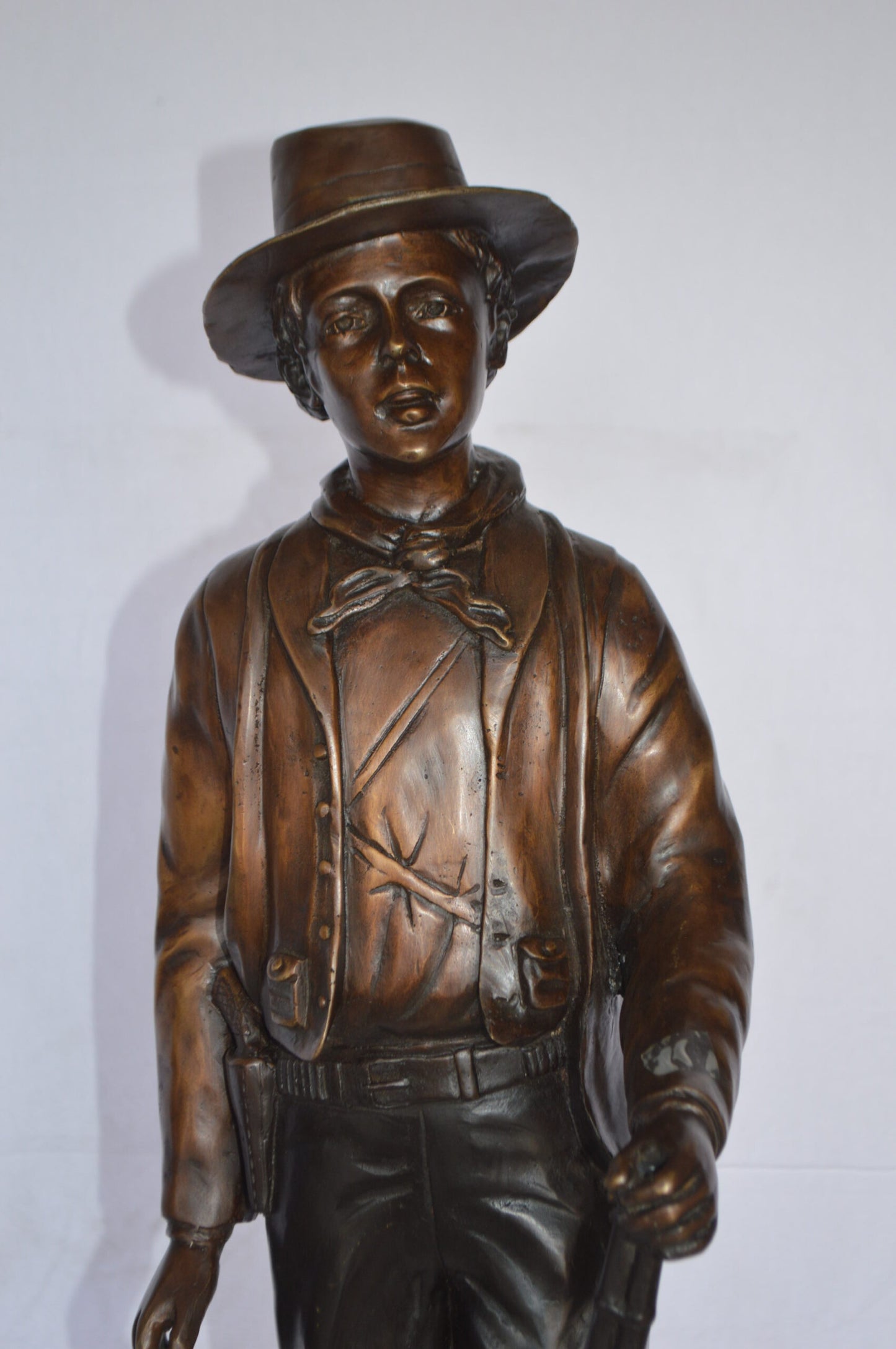 Billy the Kid Bronze Statue mounted on Marble Base -  Size: 11"L x 9"W x 31"H.