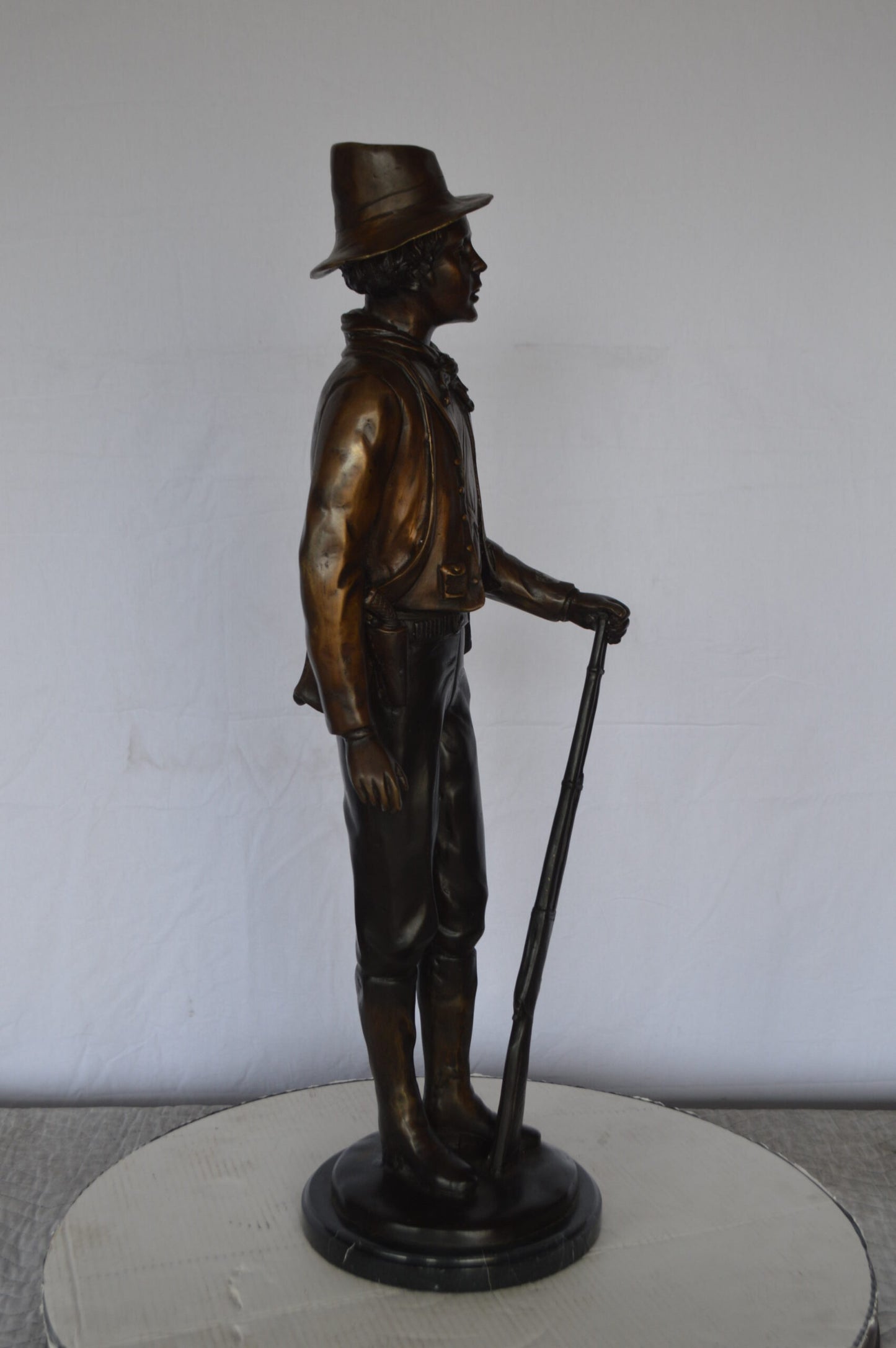 Billy the Kid Bronze Statue mounted on Marble Base -  Size: 11"L x 9"W x 31"H.