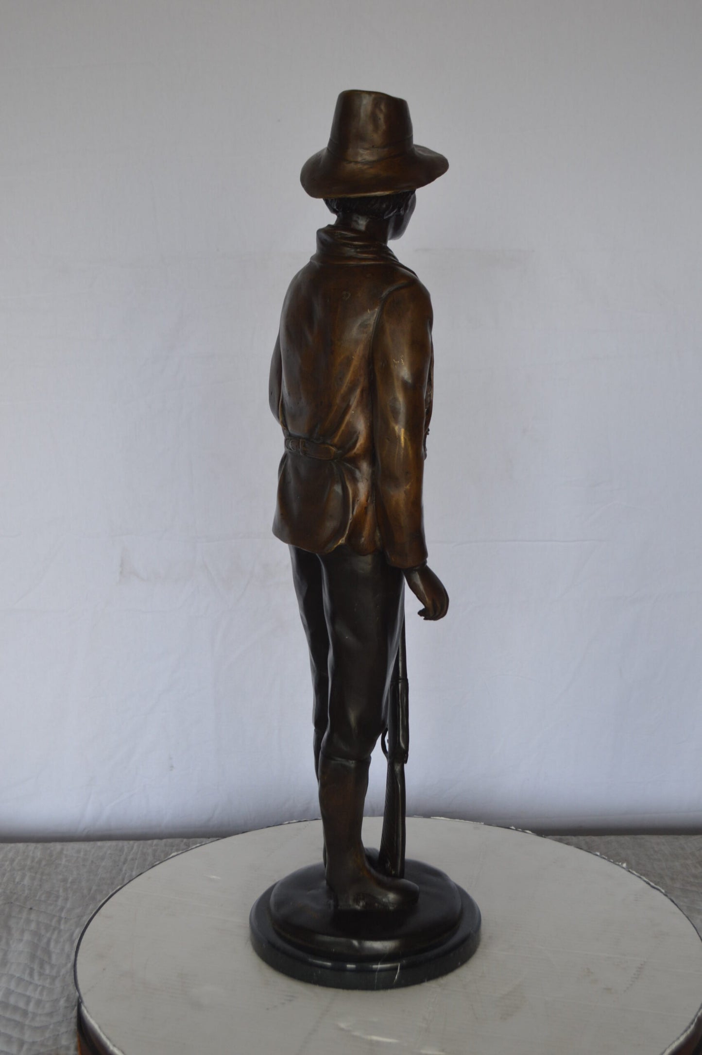 Billy the Kid Bronze Statue mounted on Marble Base -  Size: 11"L x 9"W x 31"H.