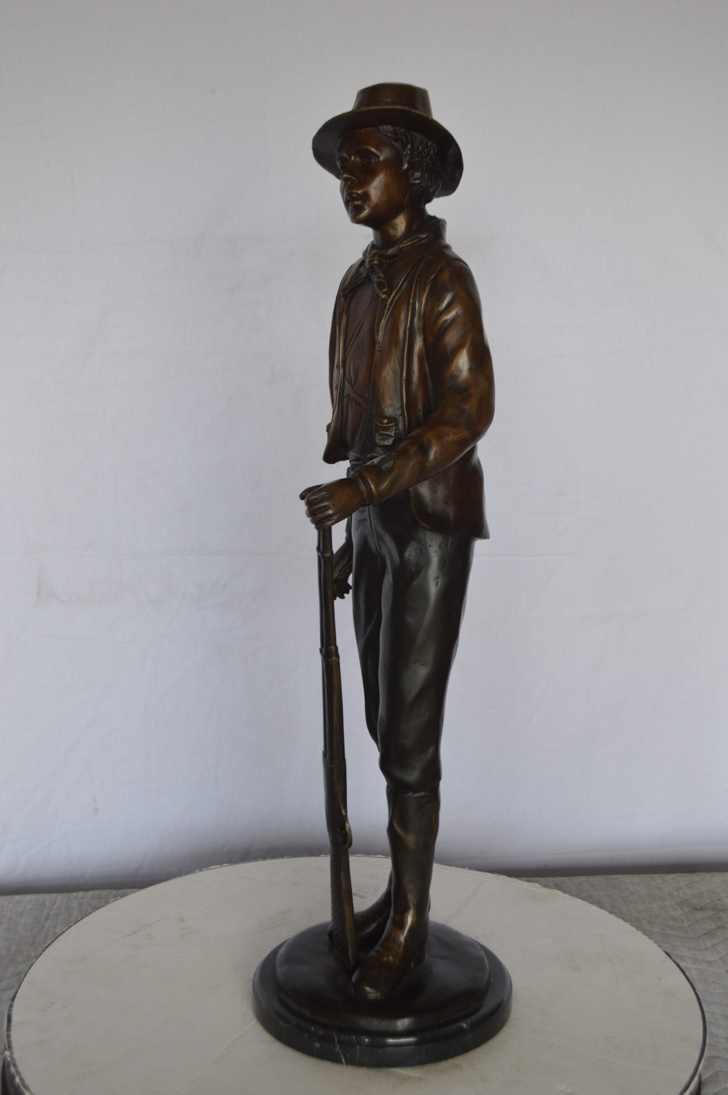 Billy the Kid Bronze Statue mounted on Marble Base -  Size: 11"L x 9"W x 31"H.