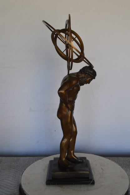 Man with Sundial on his Back Bronze Statue -  Size: 14"L x 12"W x 35"H.