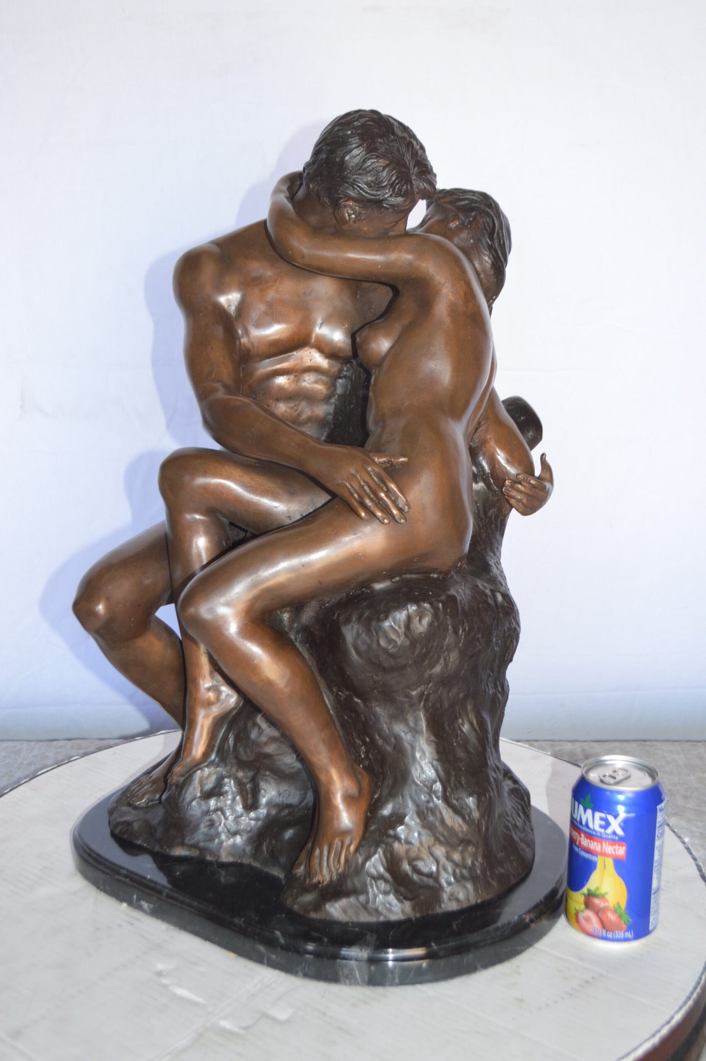 The Kiss replica by Rodin Medium Bronze Statue -  Size: 15"L x 14"W x 22"H.