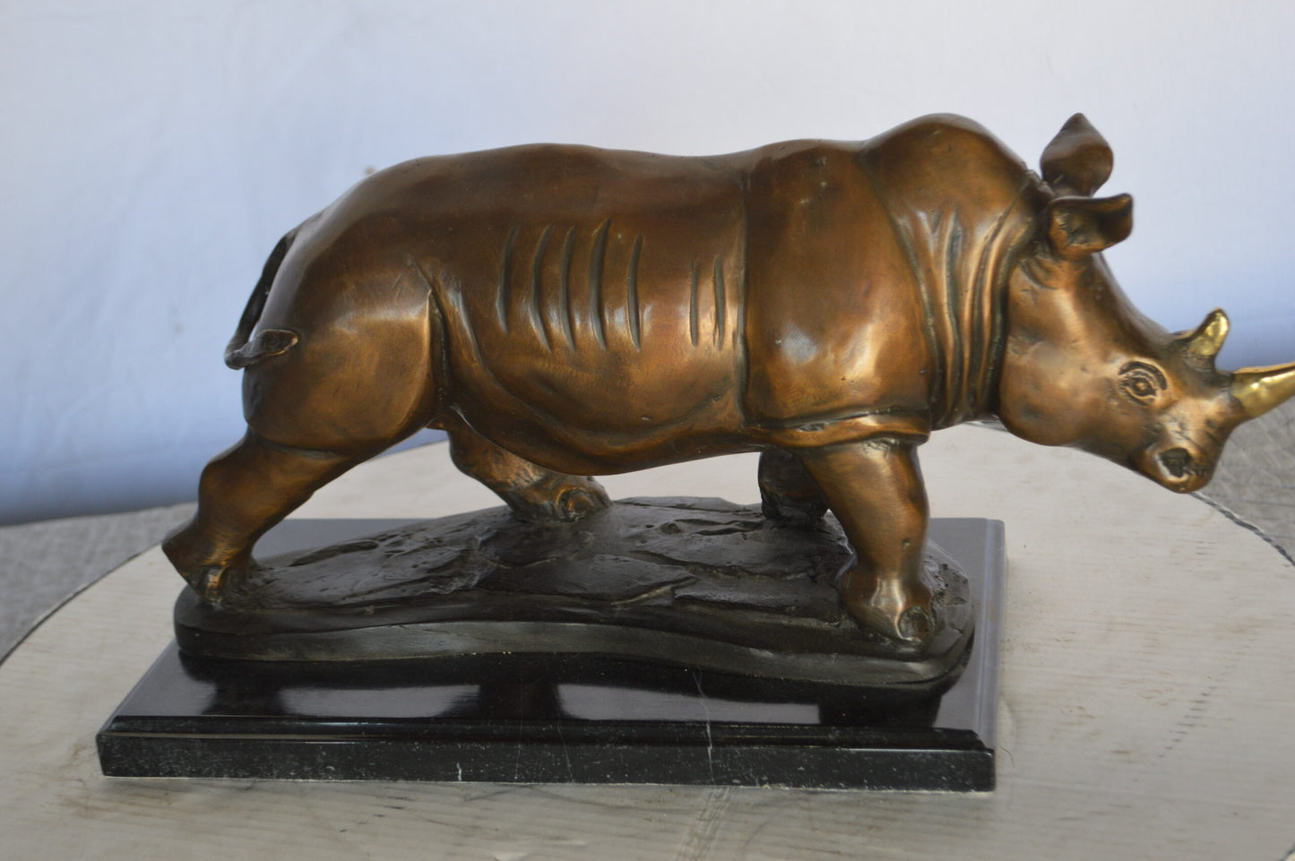 Rhino Bronze Statue Mounted  on a Marble Base -  Size: 21"L x 9"W x 10"H.