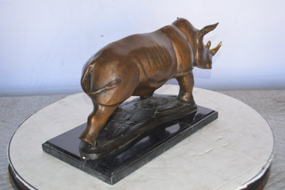 Rhino Bronze Statue Mounted  on a Marble Base -  Size: 21"L x 9"W x 10"H.