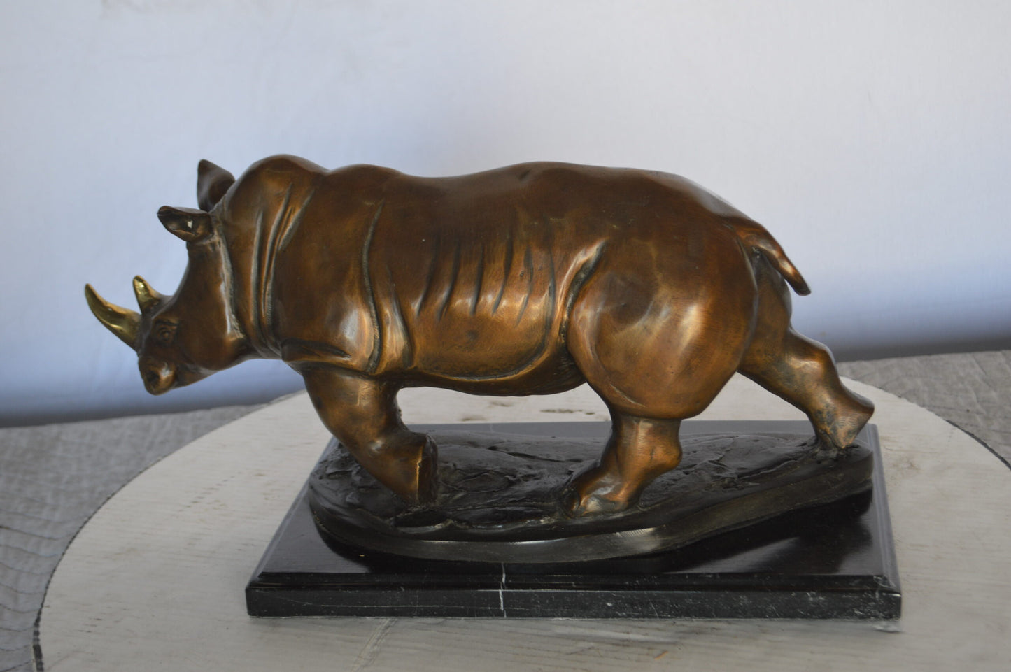 Rhino Bronze Statue Mounted  on a Marble Base -  Size: 21"L x 9"W x 10"H.