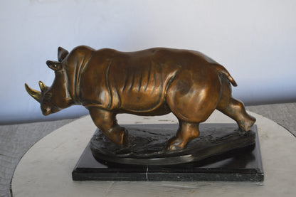 Rhino Bronze Statue Mounted  on a Marble Base -  Size: 21"L x 9"W x 10"H.