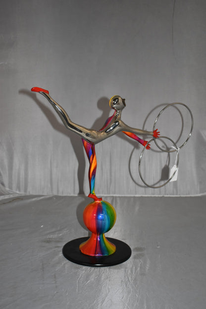 Liliana Mendez Bronze Clown on A Ball Juggling Rings Size: 21" x 8" x 18"H