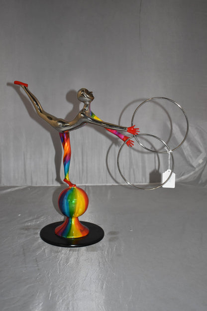 Liliana Mendez Bronze Clown on A Ball Juggling Rings Size: 21" x 8" x 18"H