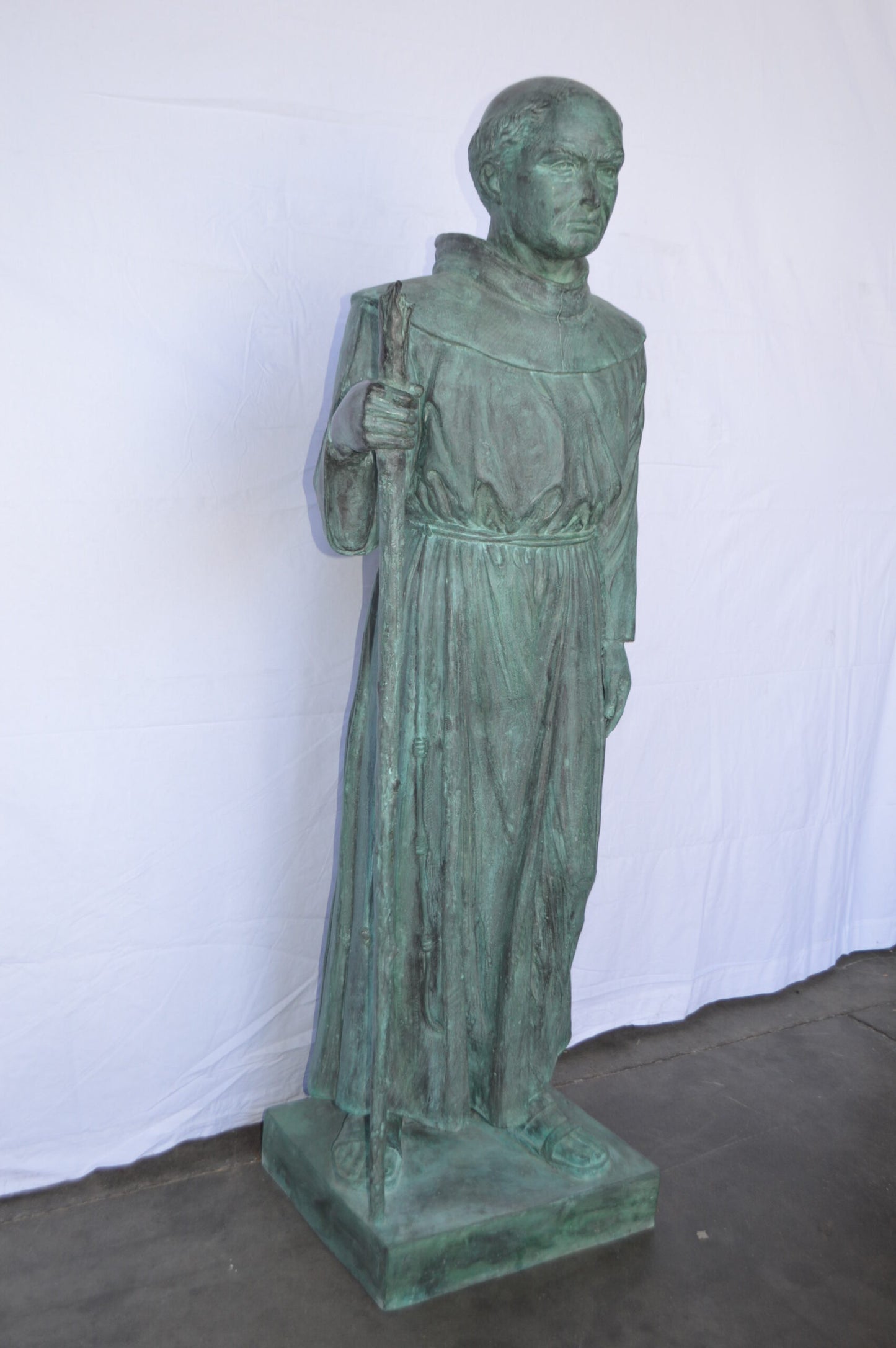 St. Serra Bronze Statue Green Patina -  Size: 22"L x 19"W x 62"H.