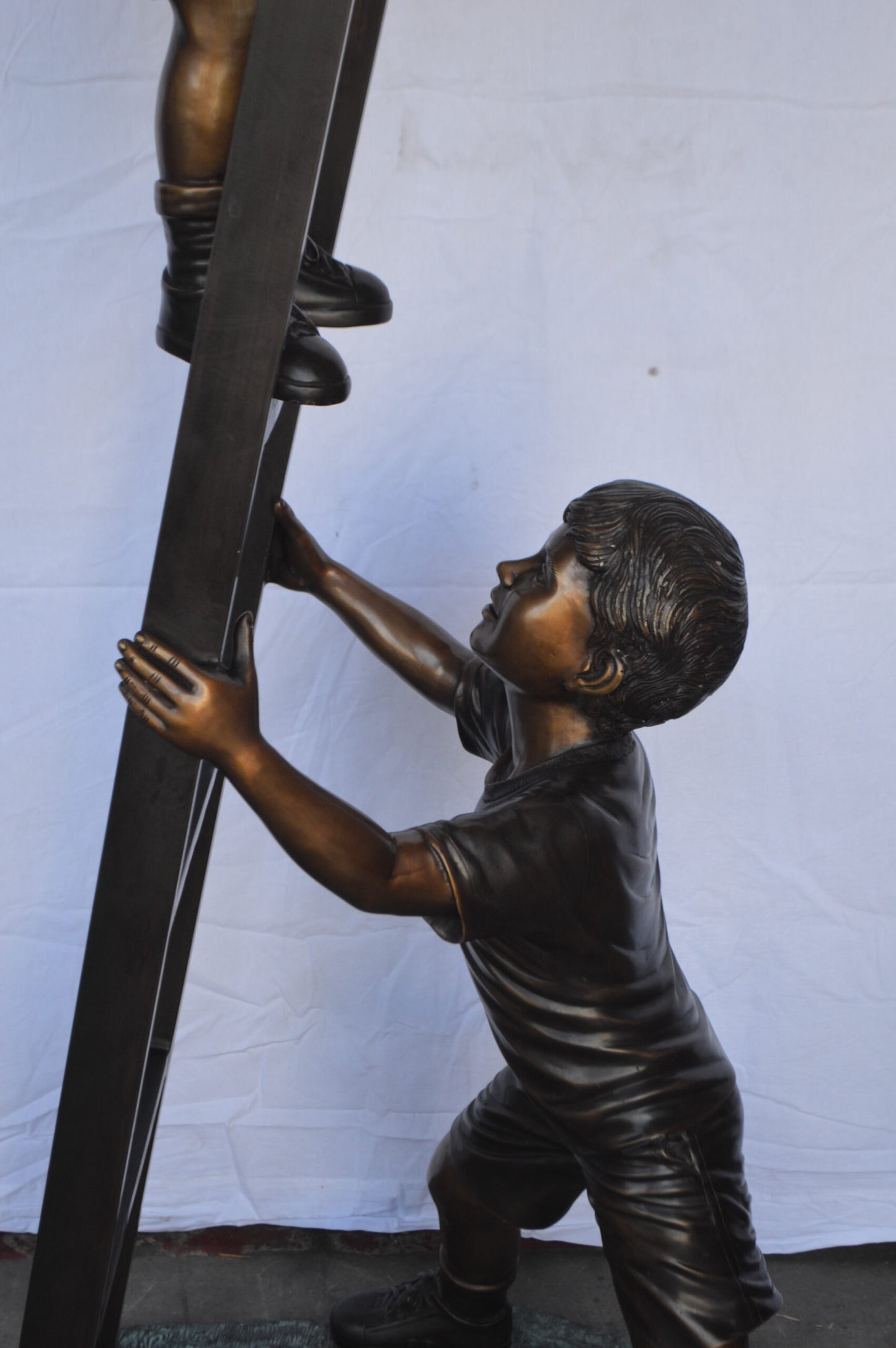 Two Kids Climb a Ladder Saving a Cat Bronze Statue -  Size: 35"L x 24"W x 81"H.