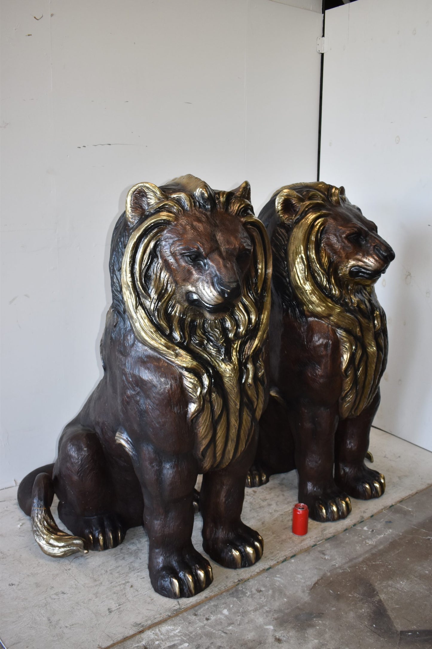 A Pair of Giant Lions with Gold Mane Bronze Statues Size: 36" x 46" x 58"H