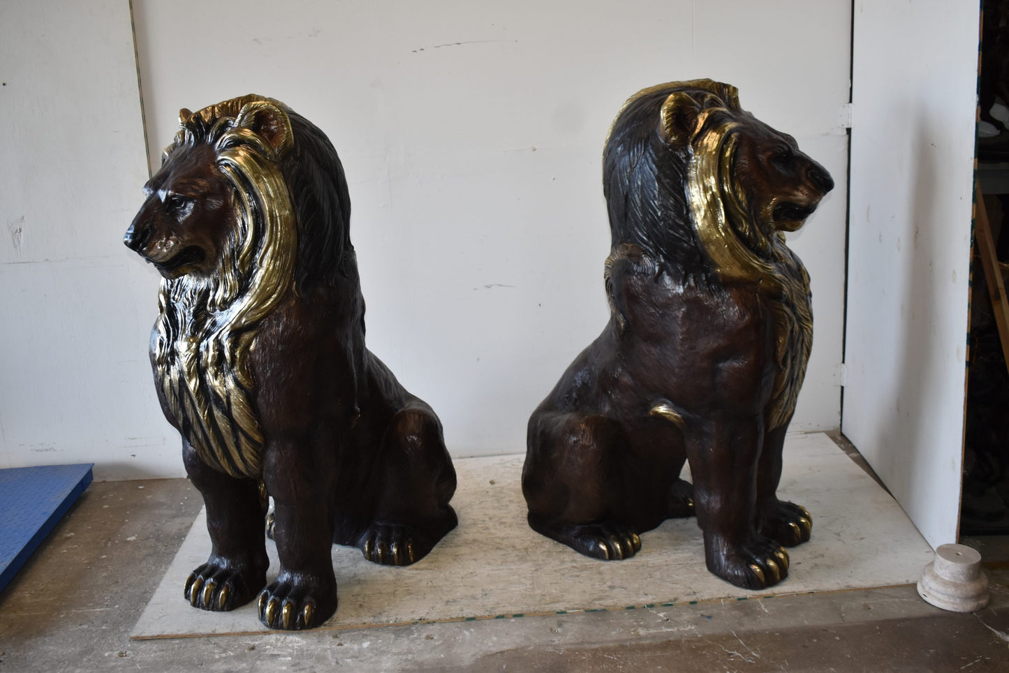 A Pair of Giant Lions with Gold Mane Bronze Statues Size: 36" x 46" x 58"H