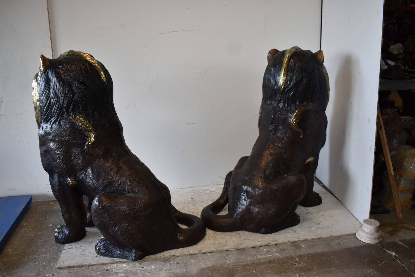 A Pair of Giant Lions with Gold Mane Bronze Statues Size: 36" x 46" x 58"H