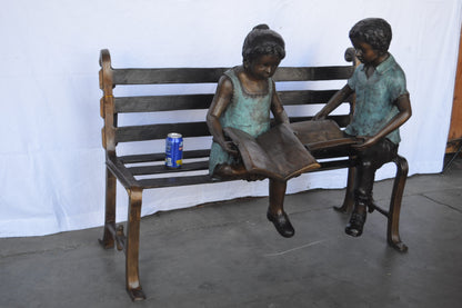 Boy And Girl Reading Books on Bench Bronze Statue -  Size: 48"L x 29"W x 39"H.
