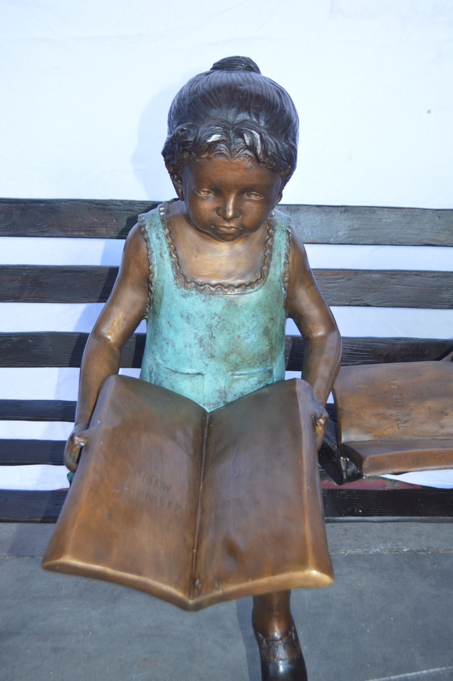 Boy And Girl Reading Books on Bench Bronze Statue -  Size: 48"L x 29"W x 39"H.