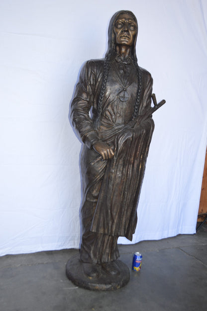 Indian Holding a Pipe Bronze Statue Life Size -  Size: 26"L x 14"W x 68"H.