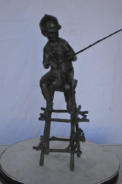 A Boy on a high Chair Fishing Bronze Statue -  Size: 16"L x 14"W x 28"H.