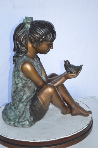 Girl Knees Up Holding a Bird Bronze Statue -  Size: 22"L x 14"W x 24"H