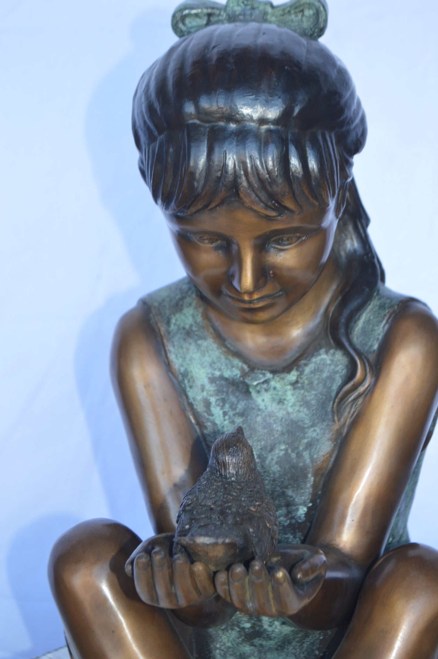 Girl Knees Up Holding a Bird Bronze Statue -  Size: 22"L x 14"W x 24"H