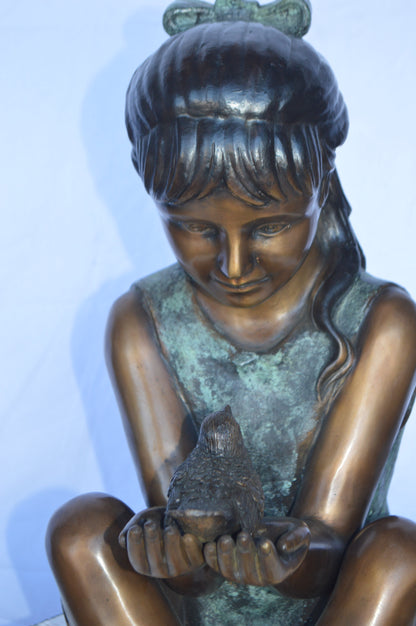 Girl Knees Up Holding a Bird Bronze Statue -  Size: 22"L x 14"W x 24"H