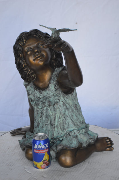 Girl Playing With Butterfly Bronze Statue -  Size: 21"L x 15"W x 19"H.