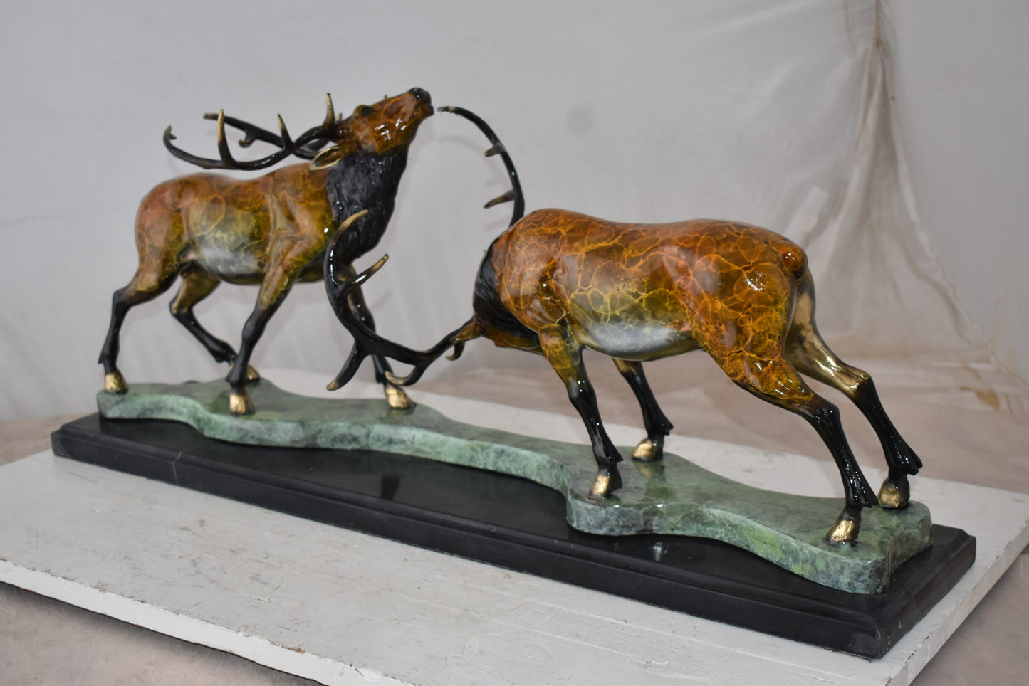 Fighting Deer Bronze Statue Mounted on a Marble Base Size: 32" x 8" x 14"H