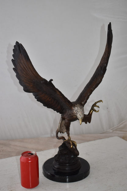 Eagle In Action Trying to Catch His Prey Bronze Statue Size: 17" x 10" x 23"H