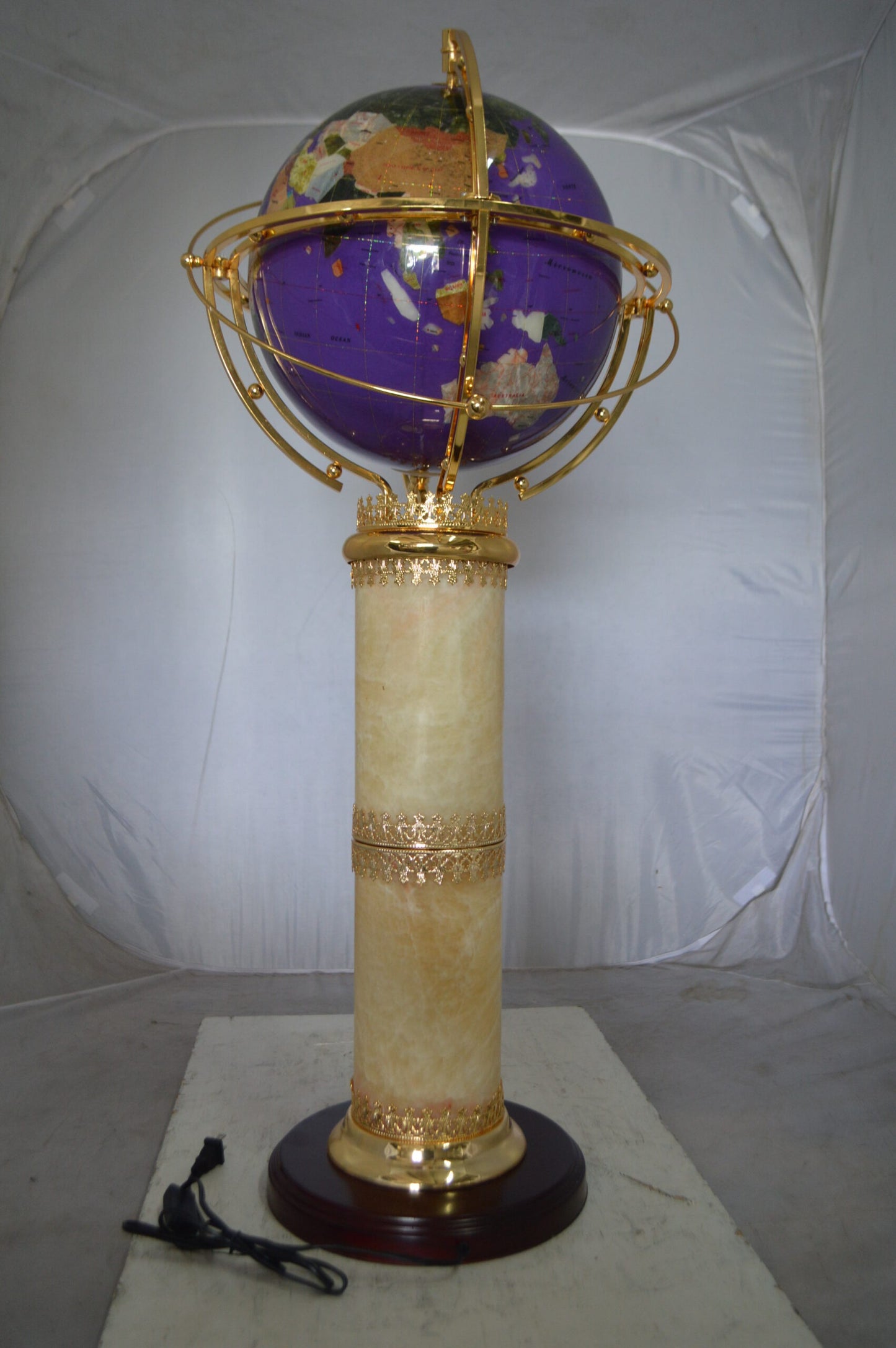 Illuminated Purple World Globe Rotated by motor -  Size: 19"L x 19"W x 42"H.