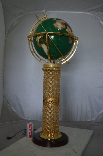 Illuminated Green World Globe Rotated by motor -  Size: 19"L x 19"W x 42"H.