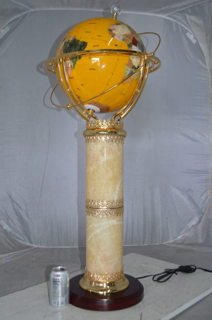 Illuminated Yellow World Globe Rotated by motor -  Size: 19"L x 19"W x 42"H.