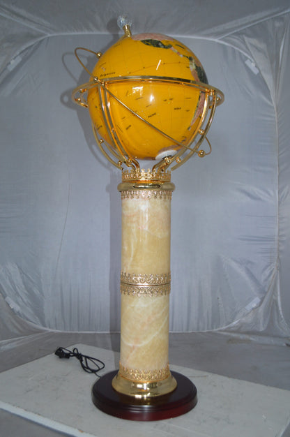 Illuminated Yellow World Globe Rotated by motor -  Size: 19"L x 19"W x 42"H.