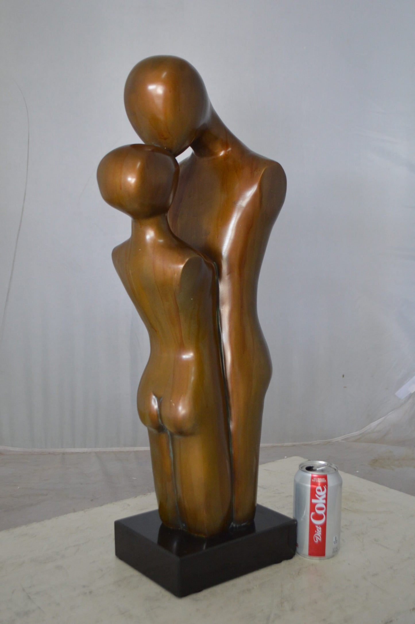 Young Lovers Kissing Resin Statue -  Size: 10"L x 8"W x 27"H.