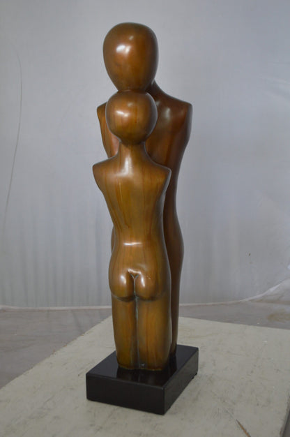 Young Lovers Kissing Resin Statue -  Size: 10"L x 8"W x 27"H.