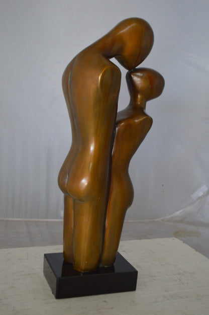 Young Lovers Kissing Resin Statue -  Size: 10"L x 8"W x 27"H.