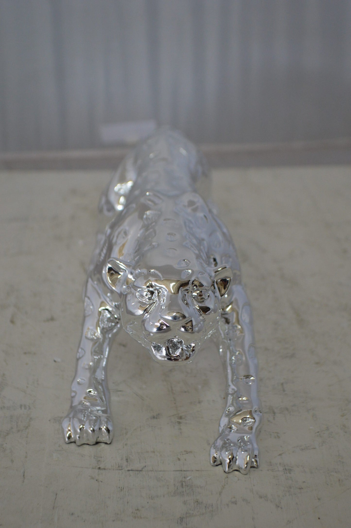 Modern Art Silver Jaguar Statue Made of Resin -  Size: 23"L x 6"W x 7"H.