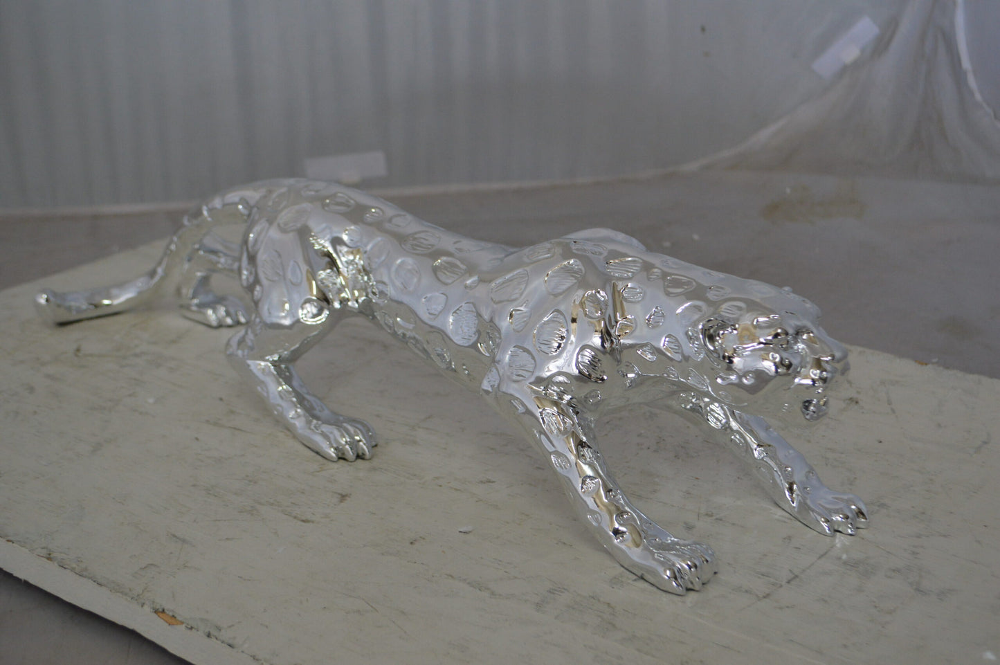 Modern Art Silver Jaguar Statue Made of Resin -  Size: 23"L x 6"W x 7"H.