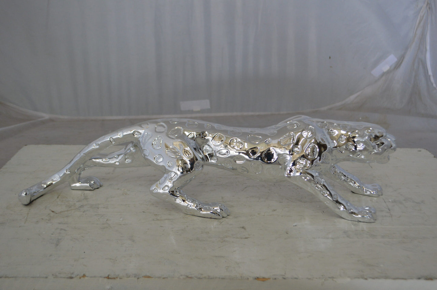 Modern Art Silver Jaguar Statue Made of Resin -  Size: 23"L x 6"W x 7"H.