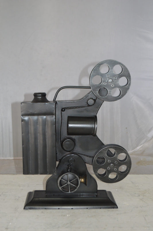 Movie Reel Abstract Metal Statue -  Size: 13"L x 4"W x 19"H.