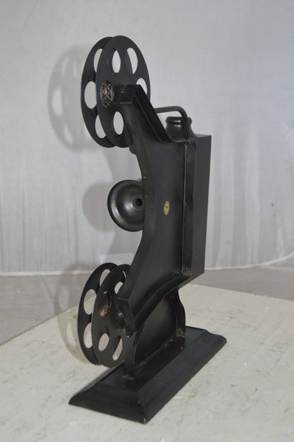 Movie Reel Abstract Metal Statue -  Size: 13"L x 4"W x 19"H.