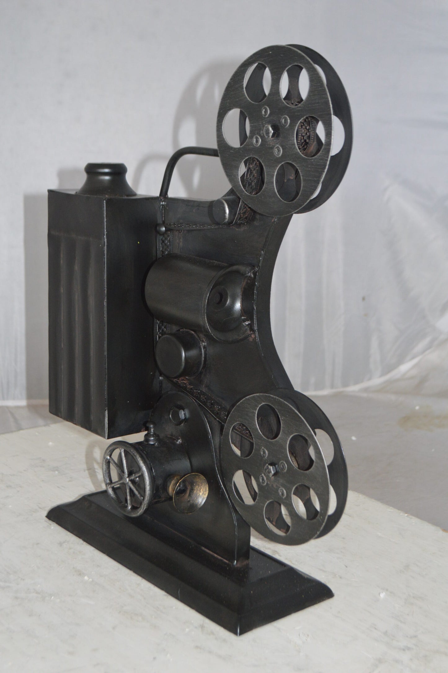Movie Reel Abstract Metal Statue -  Size: 13"L x 4"W x 19"H.