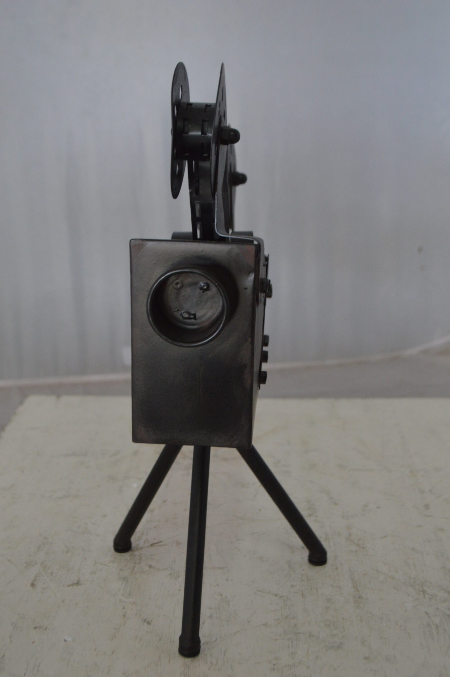 Movie Reel Abstract Metal Statue on tripod -  Size: 12"L x 6"W x 15"H.