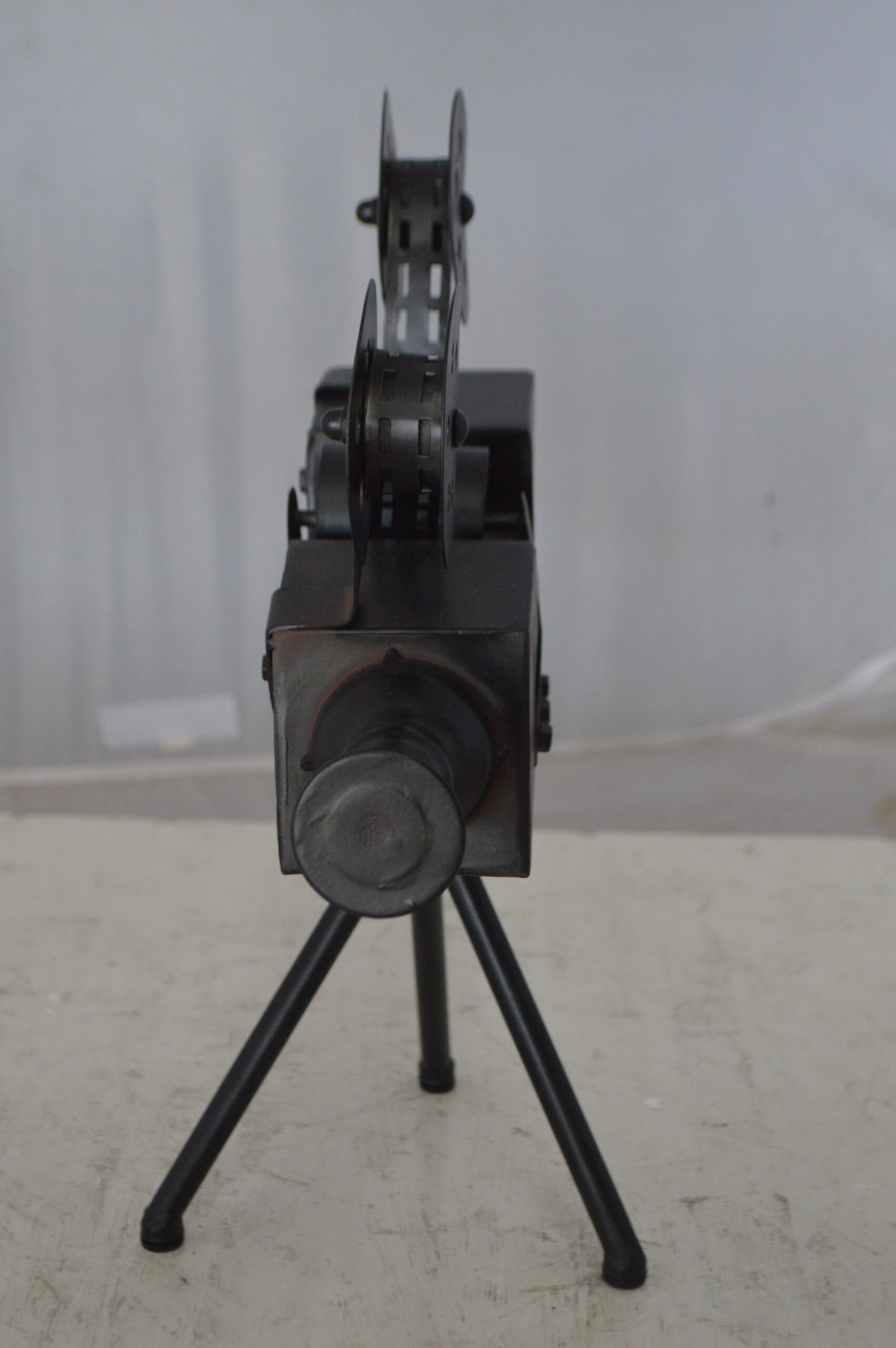 Movie Reel Abstract Metal Statue on tripod -  Size: 12"L x 6"W x 15"H.